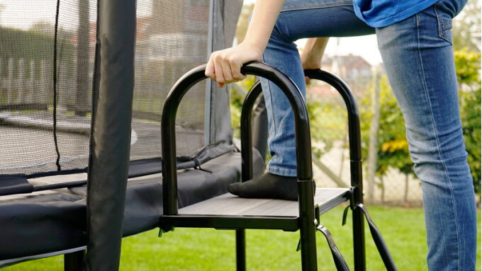 A dug-in trampoline or a trampoline on legs?